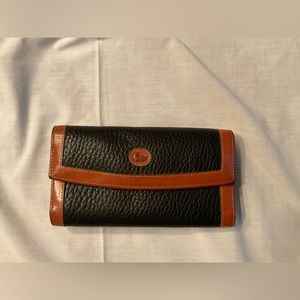 Dooney Bourke Black wallet with tan trim